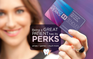 Perfect Perks logo on cards, being help by a smiling young woman