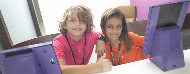 Photo of two smiling kids - Kids Club: get-aligned